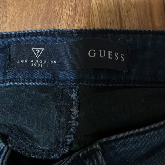 Dark denim with ripped front design soft and stretchy. Low rise - Picture 2 of 3